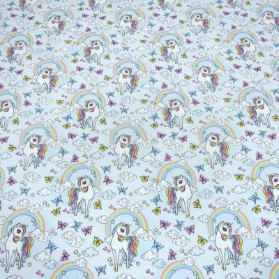 Stoff Baumwolle Jersey "dreaming unicorn" Einhorn Regenbogen Herzen hellblau bunt Kinderstoff Kleiderstoff